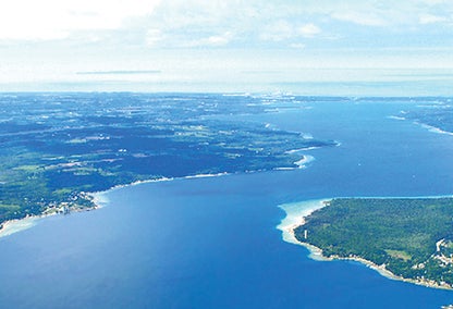 Aerial view over Boyne City, MI