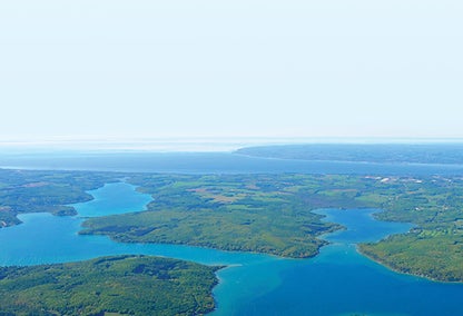 Aerial view over Walloon Lake during summertime