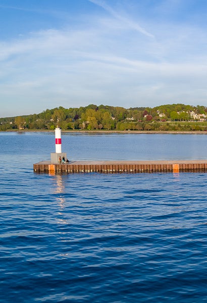 Lighthouse at end of pier in Petoskey, MI